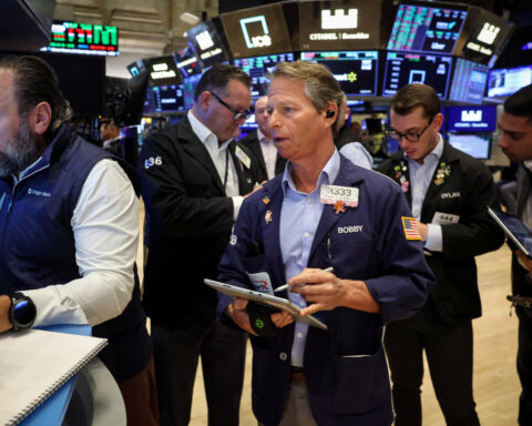 Stocks climb to record, dollar edges down on US-China trade optimism