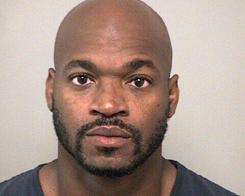 Former NFL star Adrian Peterson arrested in Houston suburb on DWI and gun charges
