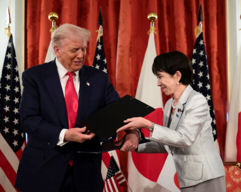 With golfing gifts, Japan PM invokes Abe's legacy to forge Trump bond