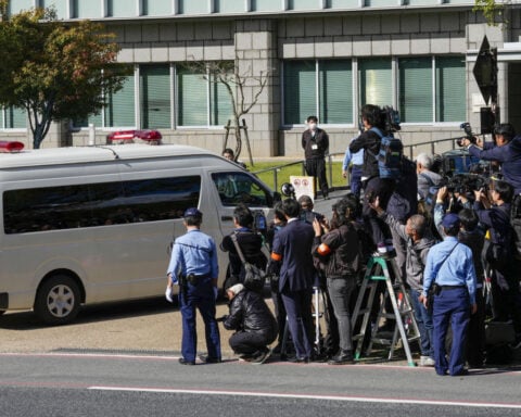 Japan defendant admits to killing ex-PM Abe in first court hearing, media say