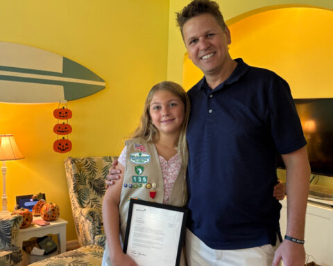 Girl Scout saves father's life thanks to first aid training, receives Medal of Honor