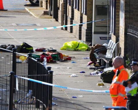 ‘Heroic’ actions of train employee and driver saved many lives in England stabbing attack, police say