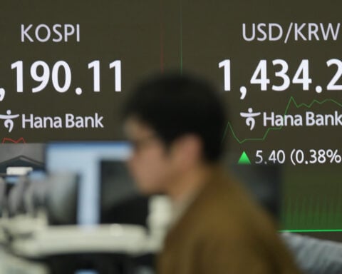 Asian shares sink after losses for Big Tech pull US stocks lower