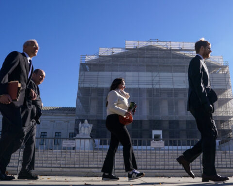 Supreme Court has a packed house for Trump tariffs case amid shutdown