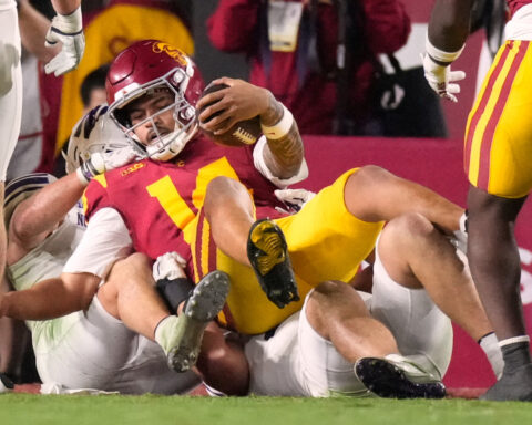 Lemon scores through air, on ground in No. 20 USC's 38-17 win over Northwestern