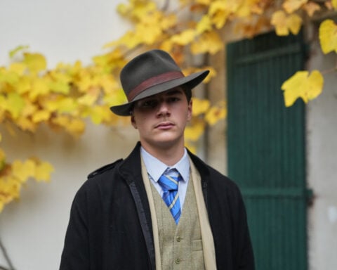 Fedora man unmasked: Meet the teen behind the Louvre mystery photo