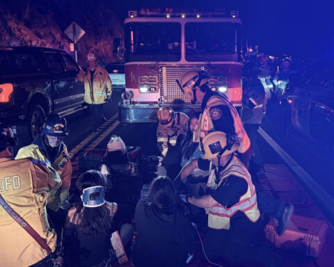 20 taken to the hospital after bus overturns on a winding road in Southern California