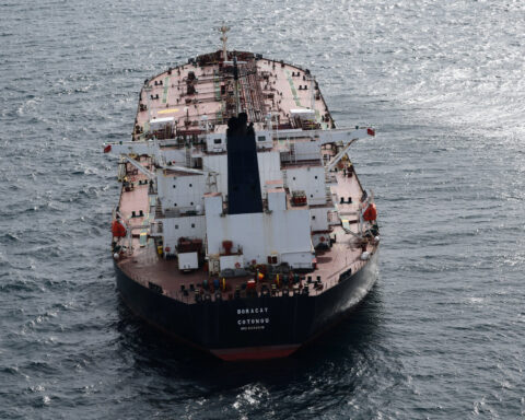 Oil up as investors balance sanctions risks, oversupply worries