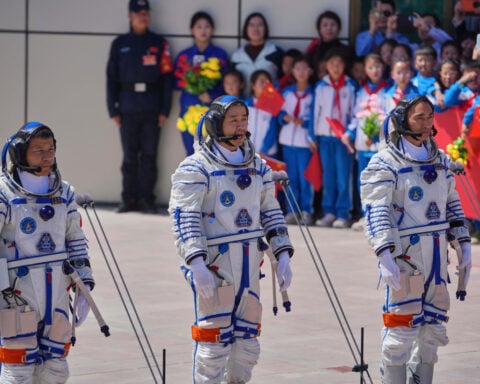 China's stranded astronauts 'in good condition' after space debris delays planned return