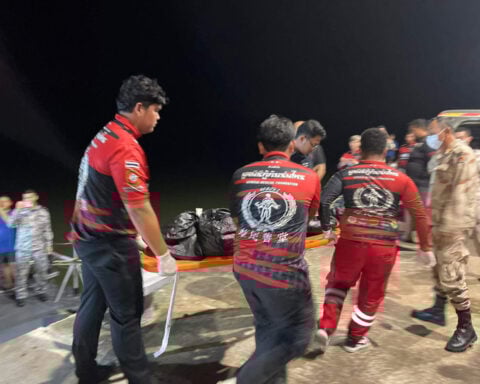 Death toll from capsized boat with Myanmar migrants climbs to 27 as more bodies recovered