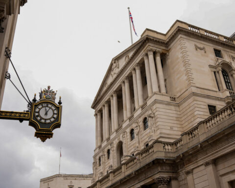 Bank of England sees wider QE benefits cushioning big losses