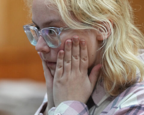 Russian court extends jailing of teenage singer over street performance of anti-war songs