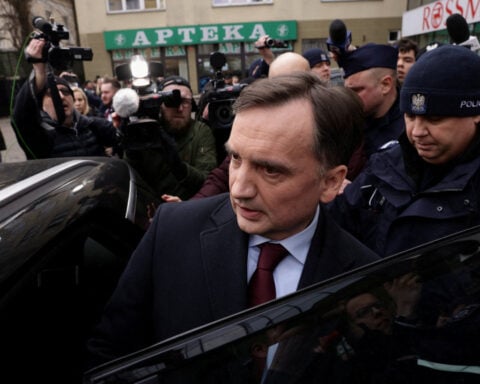 Ex-Polish justice minister offers to be questioned abroad, lawyer says