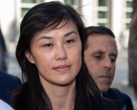 Former aide to two NY governors, accused of being Chinese agent, goes on trial for money laundering and fraud