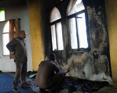 Israeli settlers torch mosque and spray graffiti in latest West Bank attack
