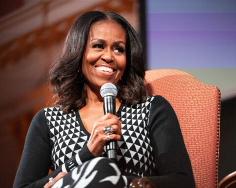 From gowns to pantsuits, Michelle Obama explains her iconic fashion picks in a new book, 'The Look'