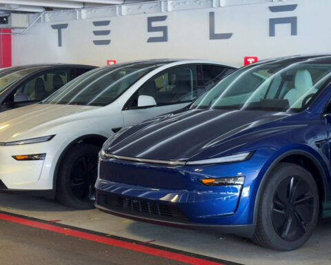 Tesla working to integrate Apple CarPlay in its EVs, Bloomberg News reports