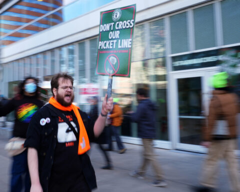Starbucks workers kick off 65-store US strike on company's busy Red Cup Day