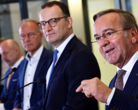 German ruling parties reach compromise on military service