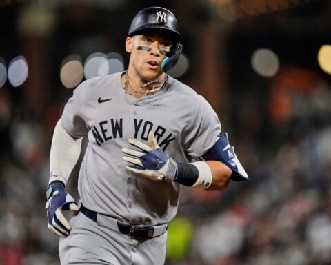 Ohtani is unanimous MVP for 4th time in winning NL honor as Judge edges Raleigh for 3rd AL accolade