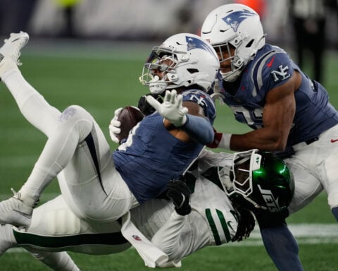 TreVeyon Henderson scores 3 TDs, Patriots beat Jets 27-14 for 8th straight win