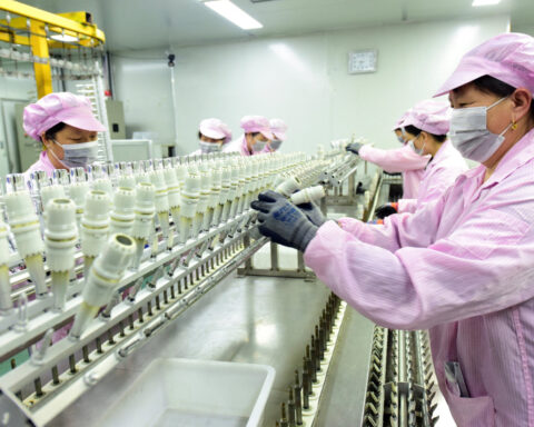 China's economy jolted by weakest factory output, retail sales growth in over a year