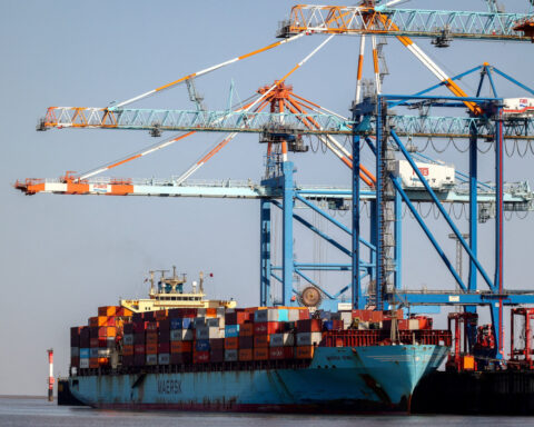 Euro zone economy holds up, trade surplus surges on exports to US