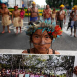 Demonstrators take to streets of Belem at halfway point of UN climate talks
