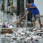 Tens of thousands rally in Manila over corruption scandal that implicates top Philippine officials