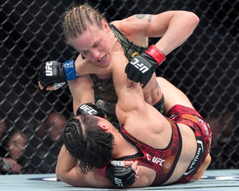 Islam Makhachev wins 170-pound title, ties UFC record with 16th straight victory