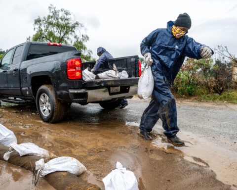 Lingering thunderstorms bring flooding risk after atmospheric river drenches much of California