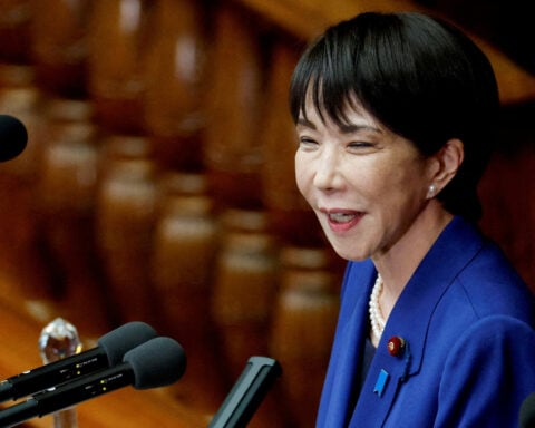 Japan seeks to calm escalating dispute with China over Taiwan