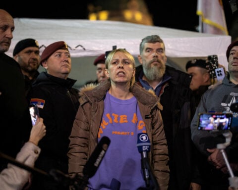 Serbian mother ends hunger strike, wants to live to join protests