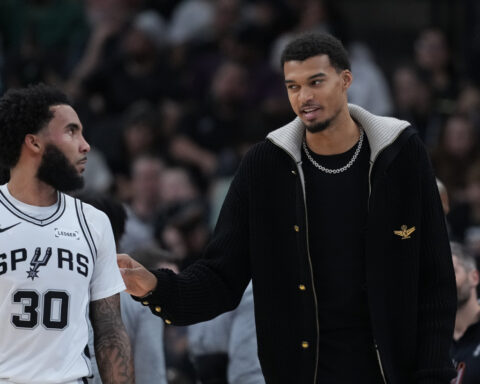 San Antonio's Victor Wembanyama to miss at least 2-3 weeks with strained calf, AP source says