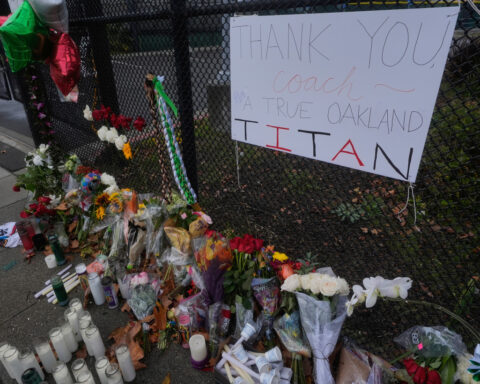 Man charged with murder in shooting of Oakland football coach and 'Last Chance U' star John Beam