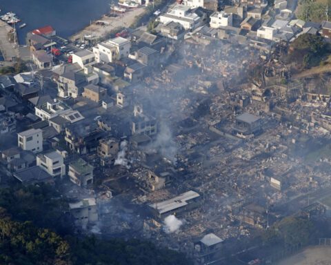 Japan's biggest fire in nearly 50 years ravages 170 buildings, kills one