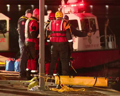 Woman taken to hospital in critical condition after vehicle drove into Inner Harbor, officials say