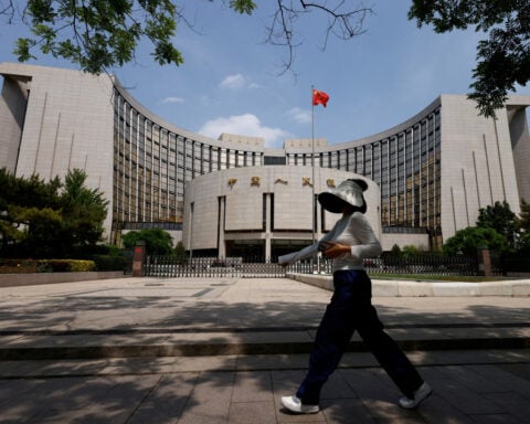 China leaves benchmark lending rates unchanged for the sixth straight month