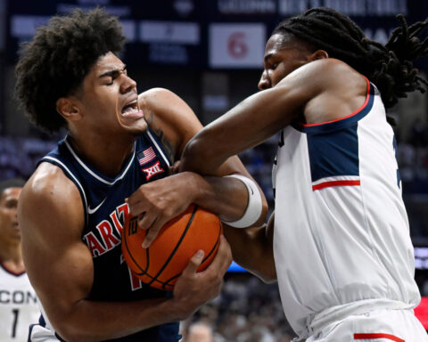 Jaden Bradley scores 21 points to lead No. 4 Arizona past No. 3 UConn 71-67