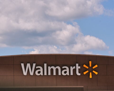 Walmart raises profit expectations as more Americans hunt deals in sluggish economy