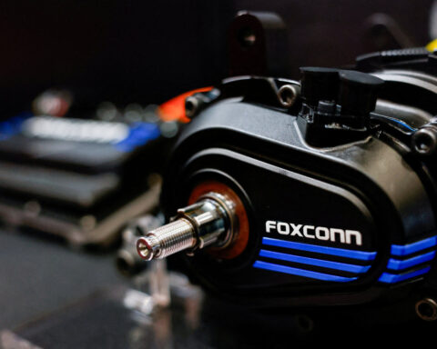 Foxconn to spend up to $3 billion a year on AI, chair sees China EV shakeout