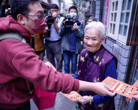 Taiwan official calls China a 'troublemaker' while distributing defence handbook