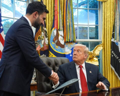 The Latest: Rep. Marjorie Taylor Greene, former Trump loyalist, says she will resign from Congress