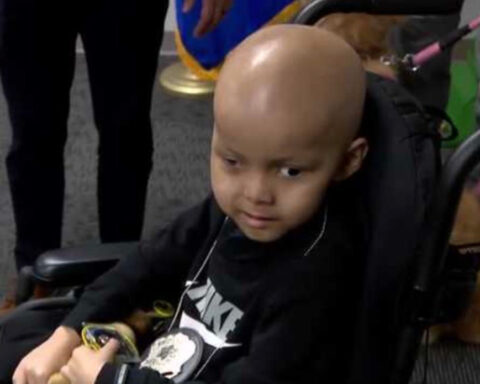Meet the newest member of the force: Milwaukee police surprise young boy fighting cancer