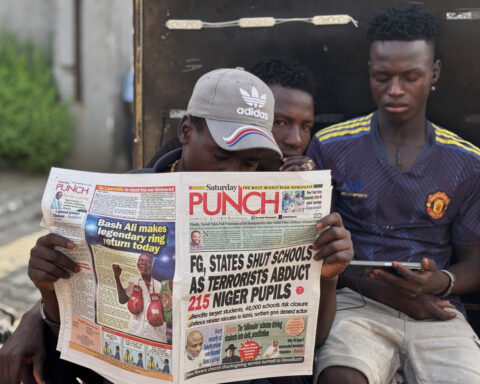 Number of children abducted in Nigerian school attack raised to more than 300