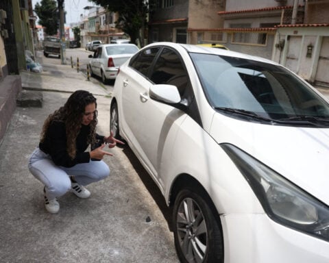 He was shot during Brazil's deadliest police raid. Now his wife is fighting to clear his name