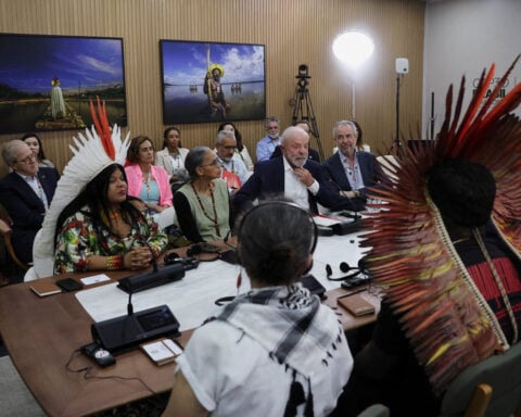 World strikes climate deal but fails to agree to a roadmap away from fossil fuels after contentious, chaotic summit