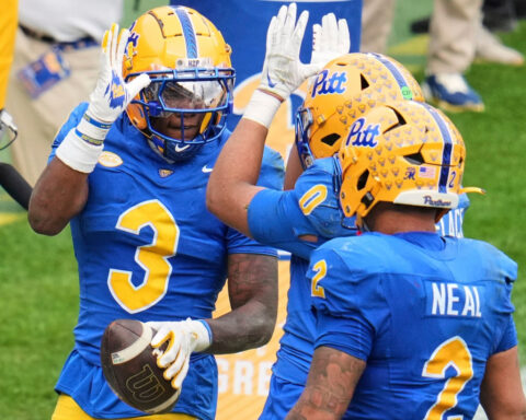 Pitt holds off No. 15 Georgia Tech 42-28 to stay alive in ACC race