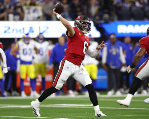 Stafford and Adams connect for 2 more TDs while NFC-leading Rams roll to 34-7 win over Buccaneers