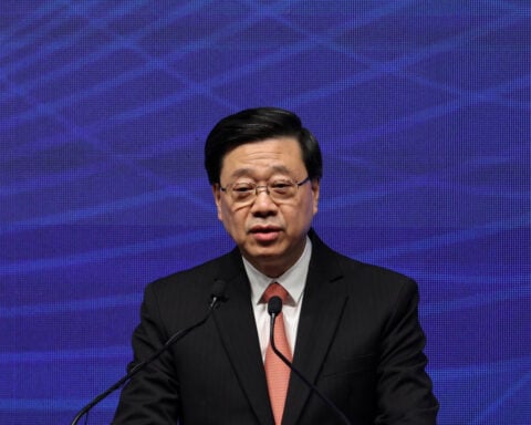 Hong Kong leader backs China's policy on Japan in first remarks on dispute